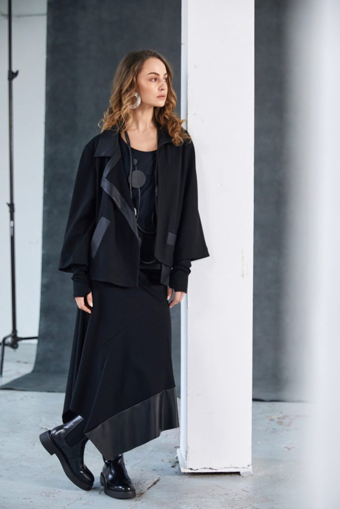 Naya Angled hem punta roma skirt with leatherette panel at hem Naw25278