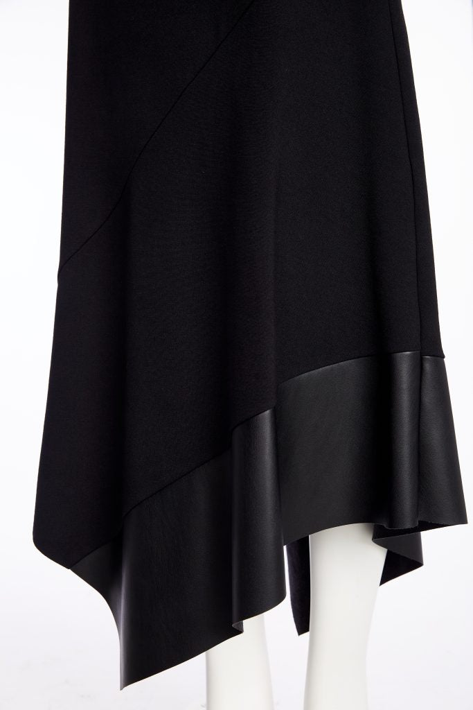 Naya Angled hem punta roma skirt with leatherette panel at hem Naw25278