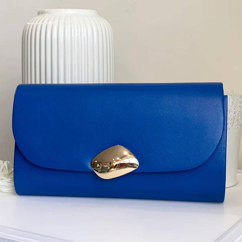 Faux leather clutch bag with gold clasp