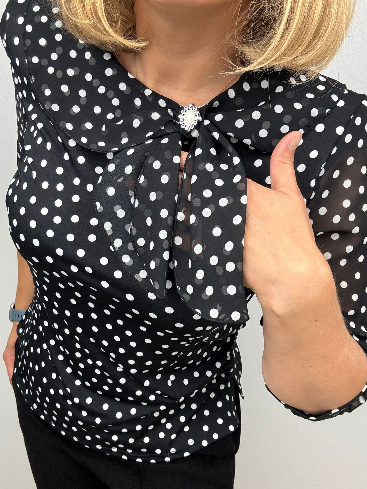 Drape neck top with chiffon sleeve and brooch detail