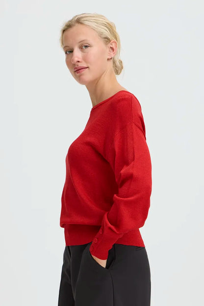 Byoung round neck Shimmer knit with button detail cuffs in Red or Black