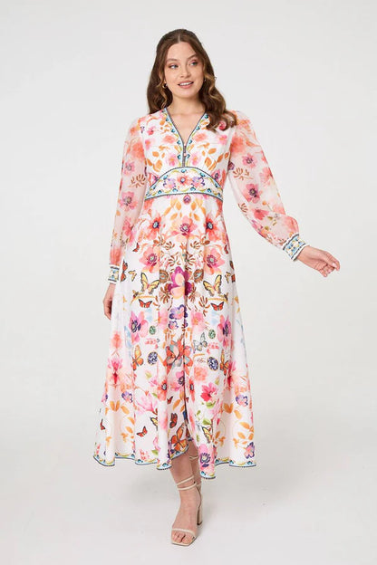 Stella Border print maxi dress with long sleeve and v neckline