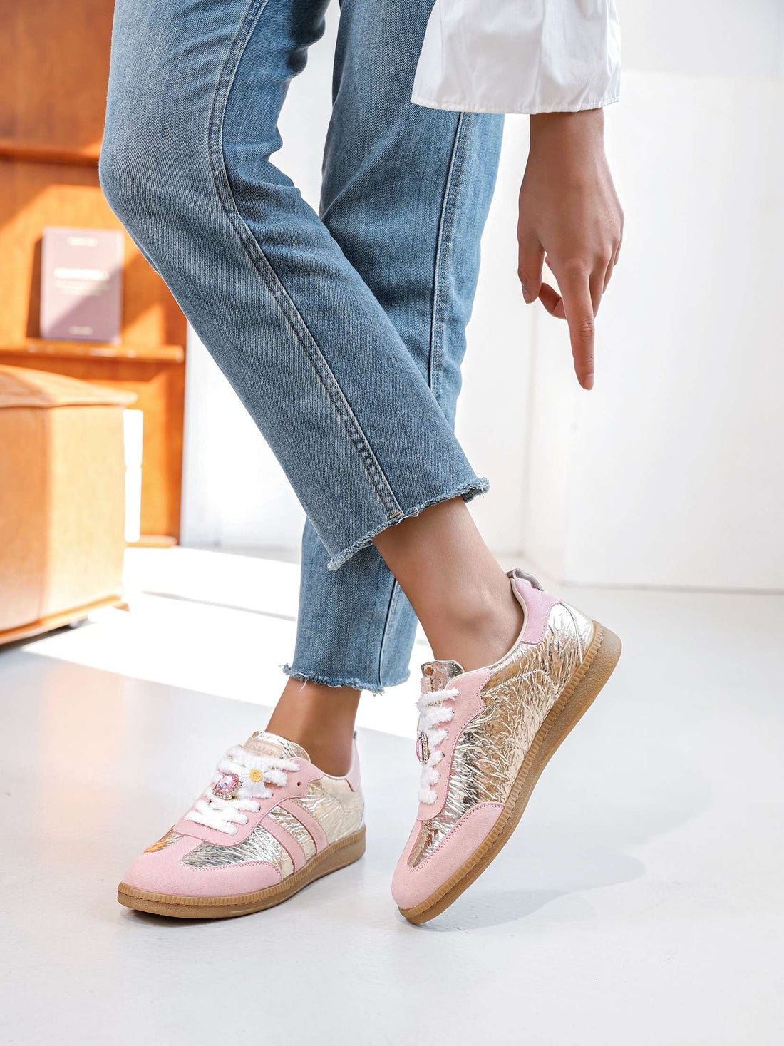Pink Metallic trainers with gold trim