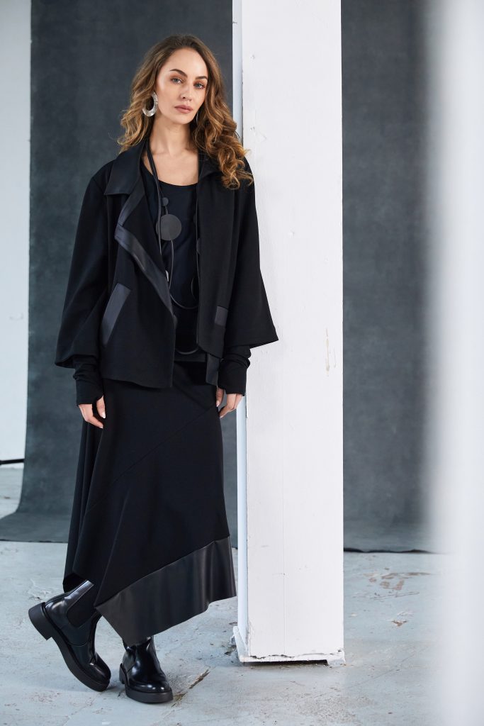 Naya Angled hem punta roma skirt with leatherette panel at hem Naw25278