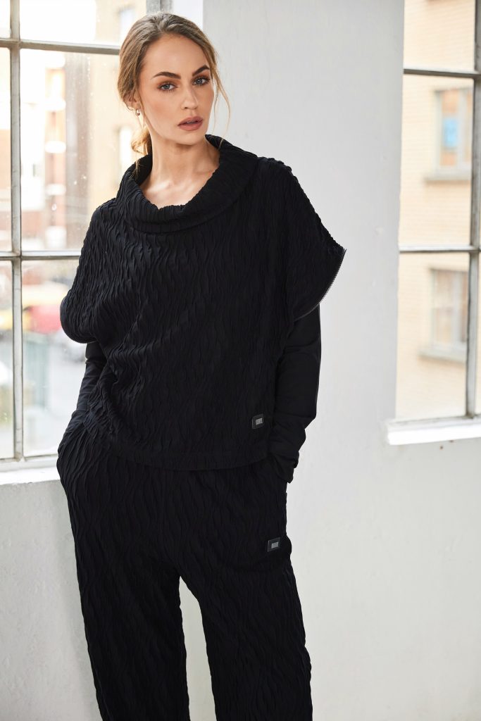 Naya Embossed knit top with collar and zip detail on side seam in Black  Naw25232