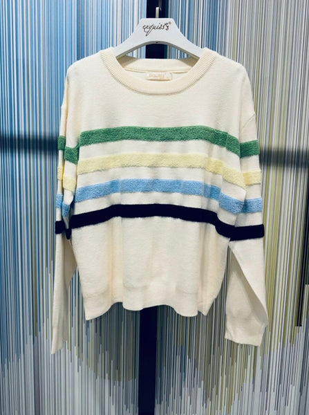 Supersoft cream sweater with Fluffy stripes .