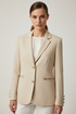 Beige blazer on model