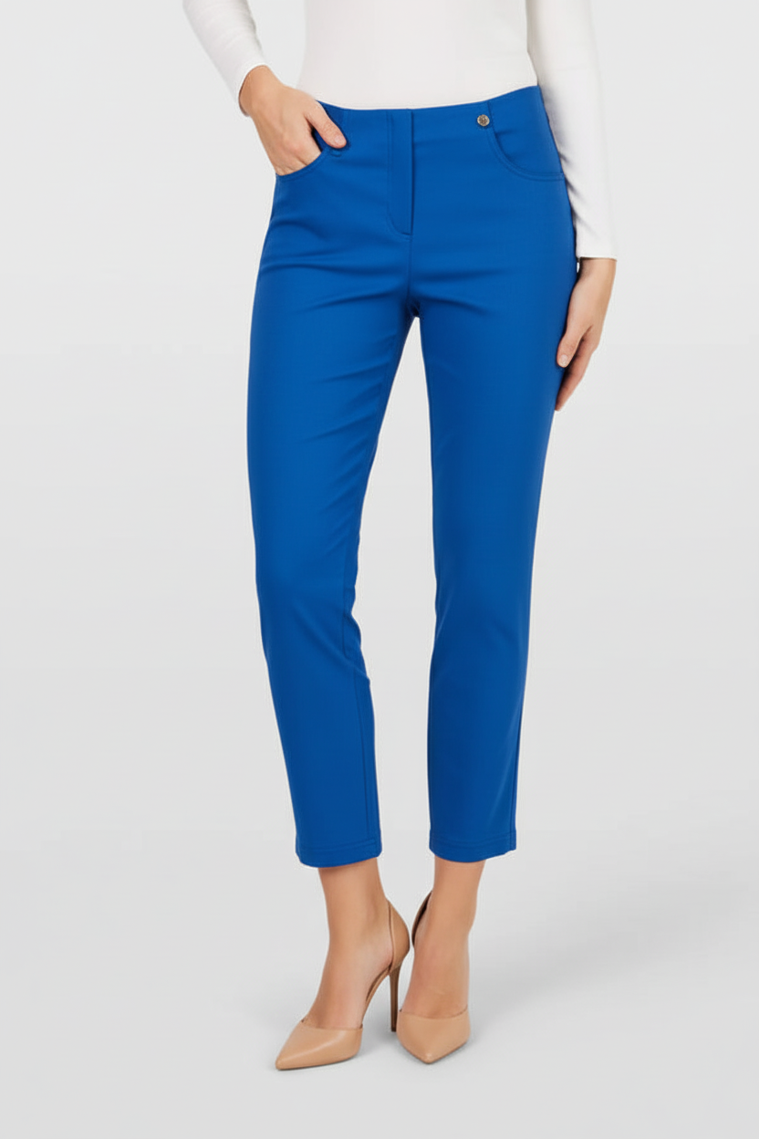 Bright royal blue trousers on model