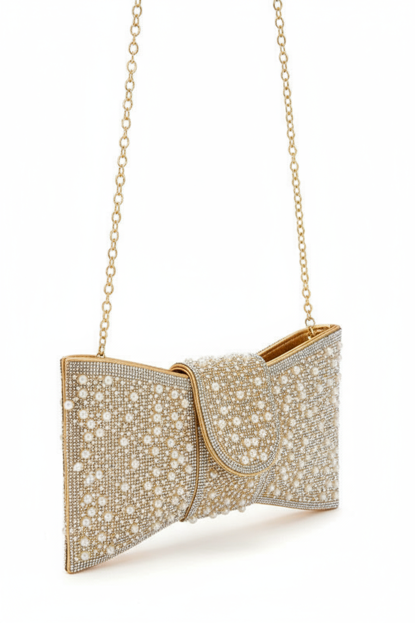 Gold and pearl clutch bag