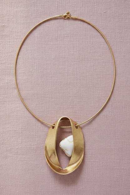Gold Choker Necklace Upright on Dusty Pink