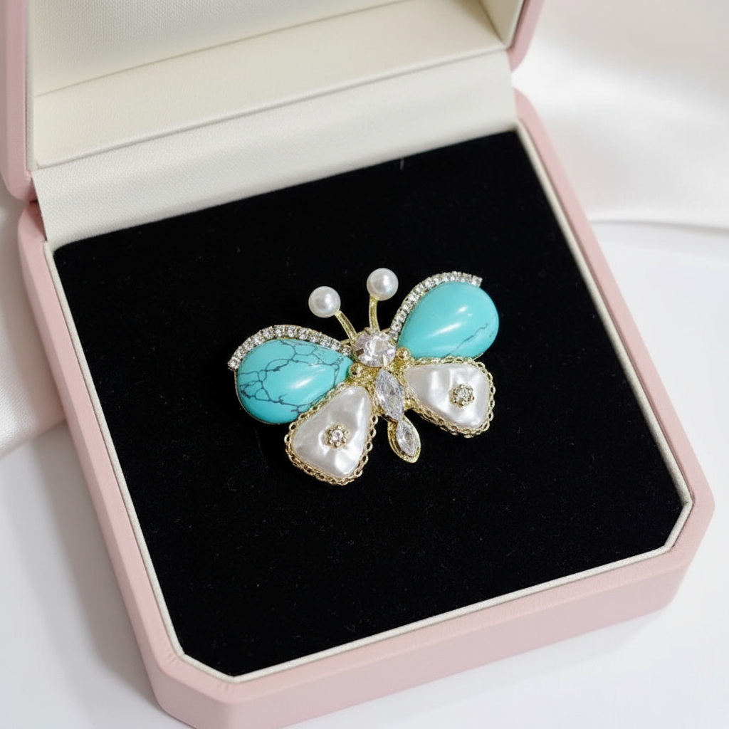 Boxed Butterfly Brooch with turquoise and Mother of Pearl detail