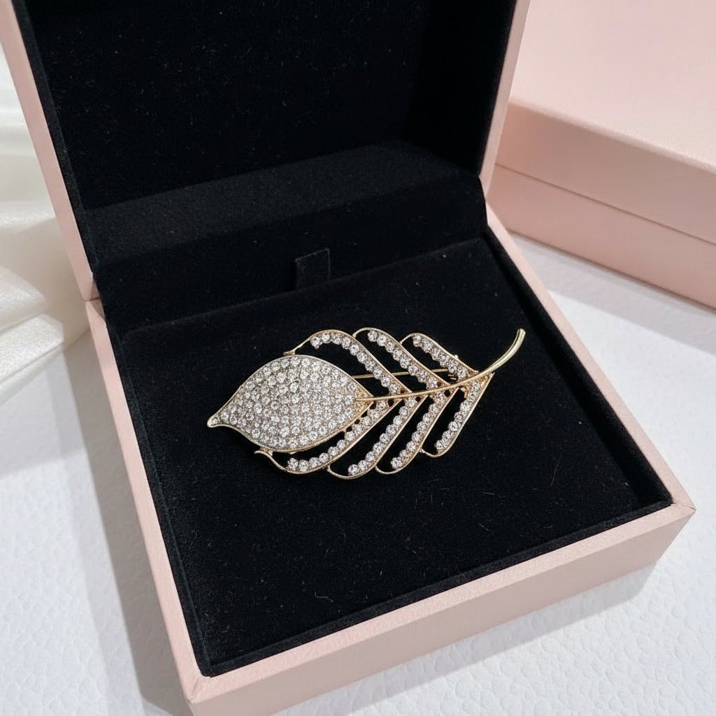 Boxed Gold Diamnte leaf brooch