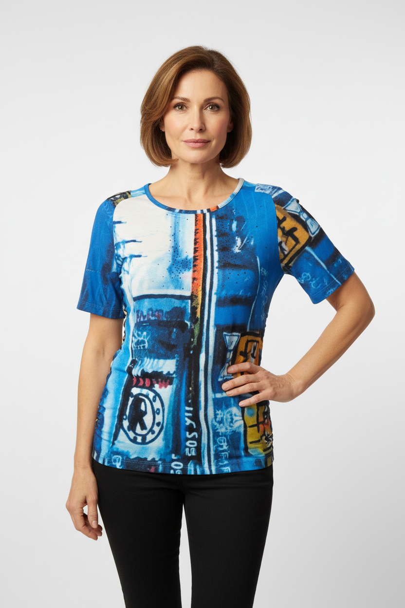 Mature model wearing fitted artistic printed top