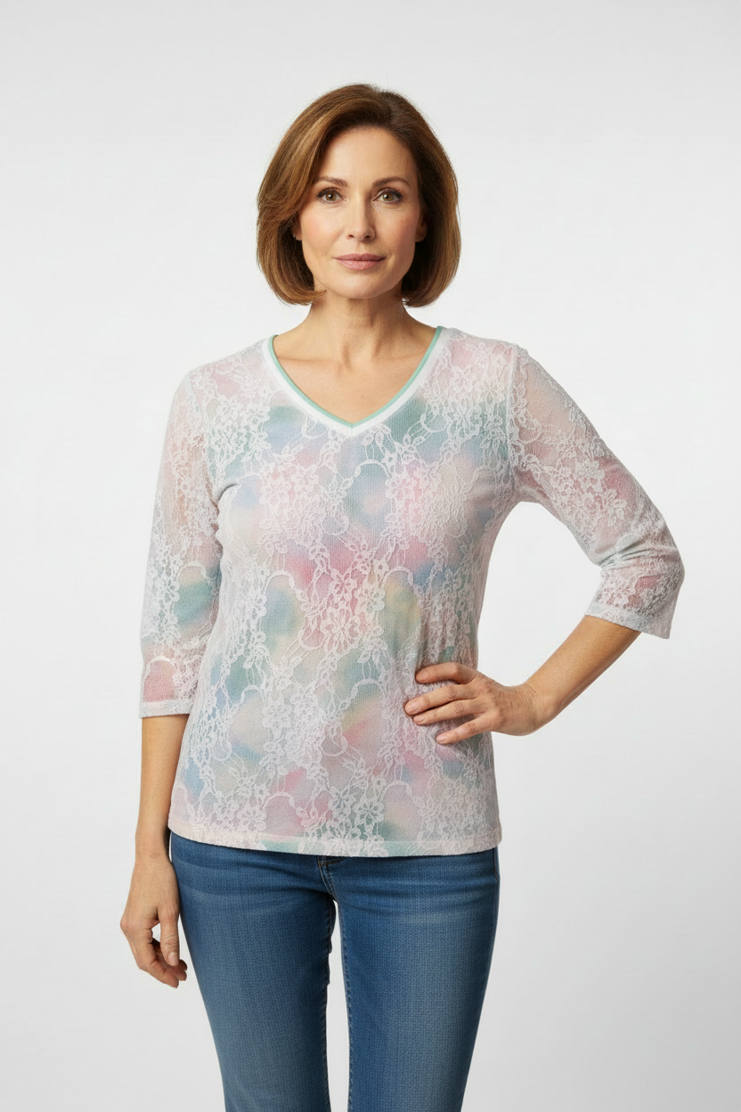 Mature model wearing pastel floral lace top with 3/4 sleeves