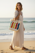 Model Carrying Colourful Fringe Tote Beach