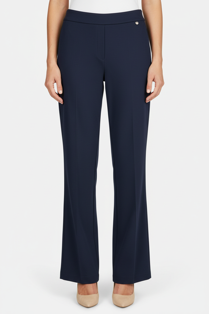 Model wearing navy Paula trousers