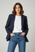 Navy blazer with denim jeans