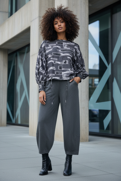 Noen Editorial — Grey Trousers &amp; Abstract Print Top