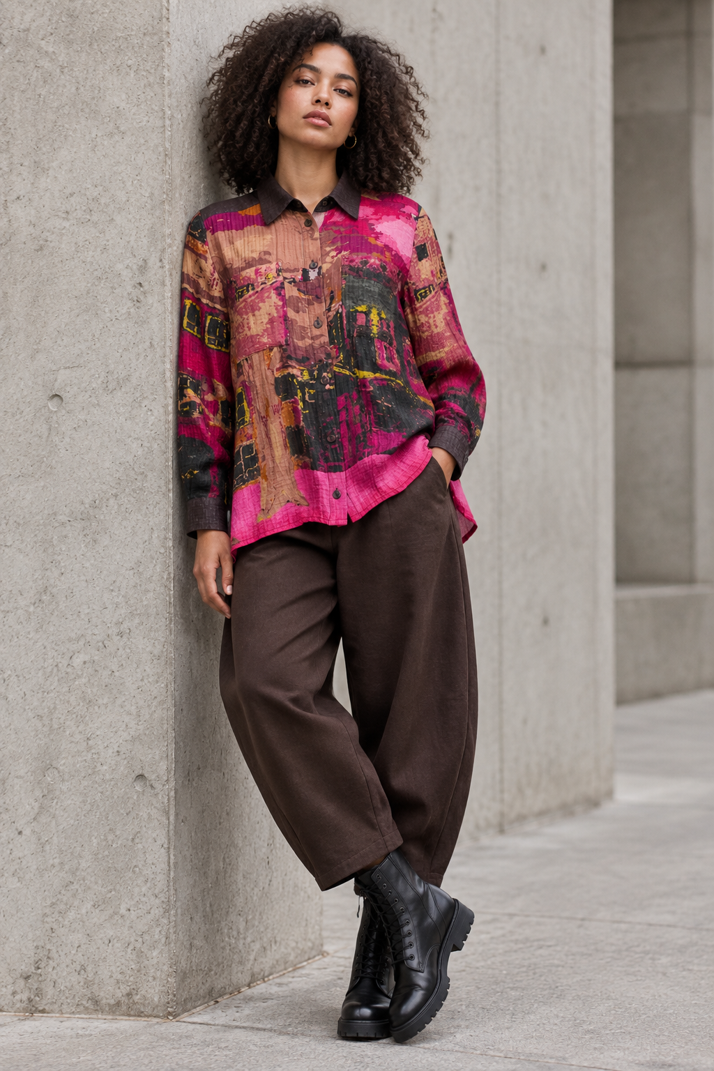 Noen printed shirt styled with brown trousers