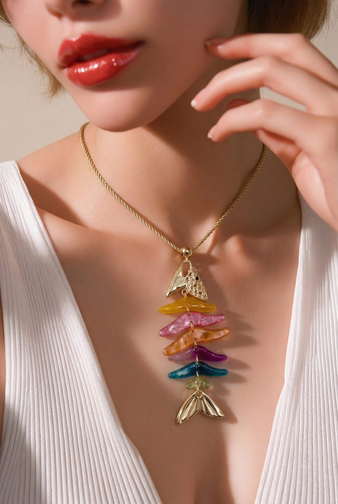Long gold chain necklace with multicoloured Fish pendant
