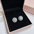 Silver halo stud earrings in pink gift box