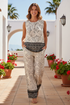 Summer lifestyle image of model in paisley co-ord