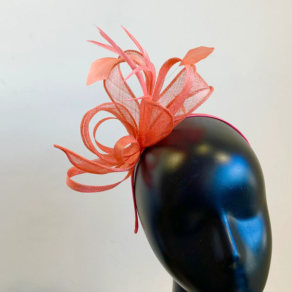 Medium size sinamay fascinator ribbon flower with feathers. . D02