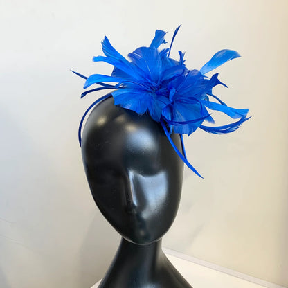 Fascinator with flower and feather detail on band D03