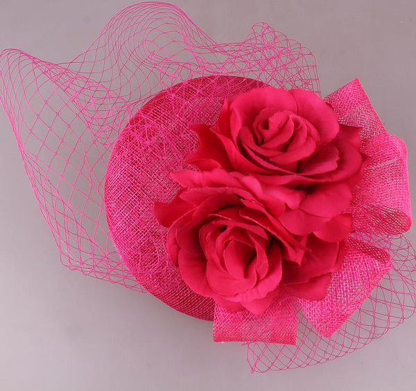 Fascinator hat with flowers and netting detail on band D15